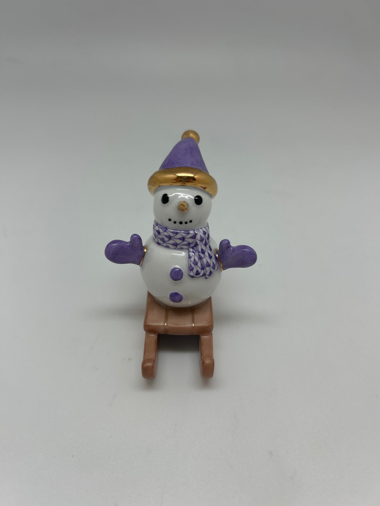 Sledding Snowman
